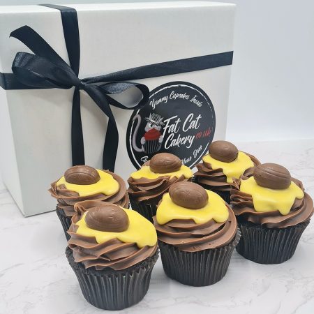 Angled with Creme Egg Chocolate Easter Cupcakes with Cupcake box and Black Ribbon